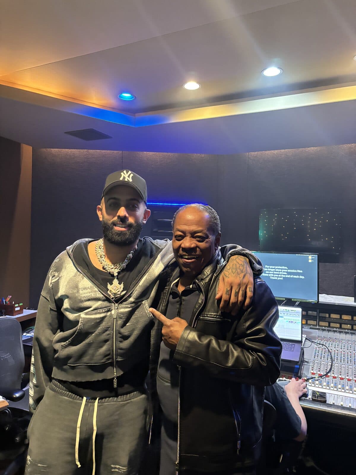 Lawrence Dopson with Eladio Carrión in the studio